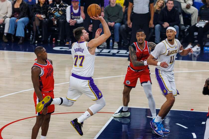 Featured image for Lakers Fall to Clippers as Luka Doncic Exits with Leg Injury