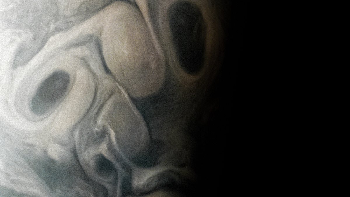 Featured image for "Juno Probe Discovers Spooky 'Face' on Jupiter and Reveals Io's Volcanic Secrets"