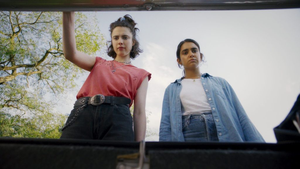 Featured image for Watch Margaret Qualley and Geraldine Viswanathan in Ethan Coen's 'Drive-Away Dolls' Trailer
