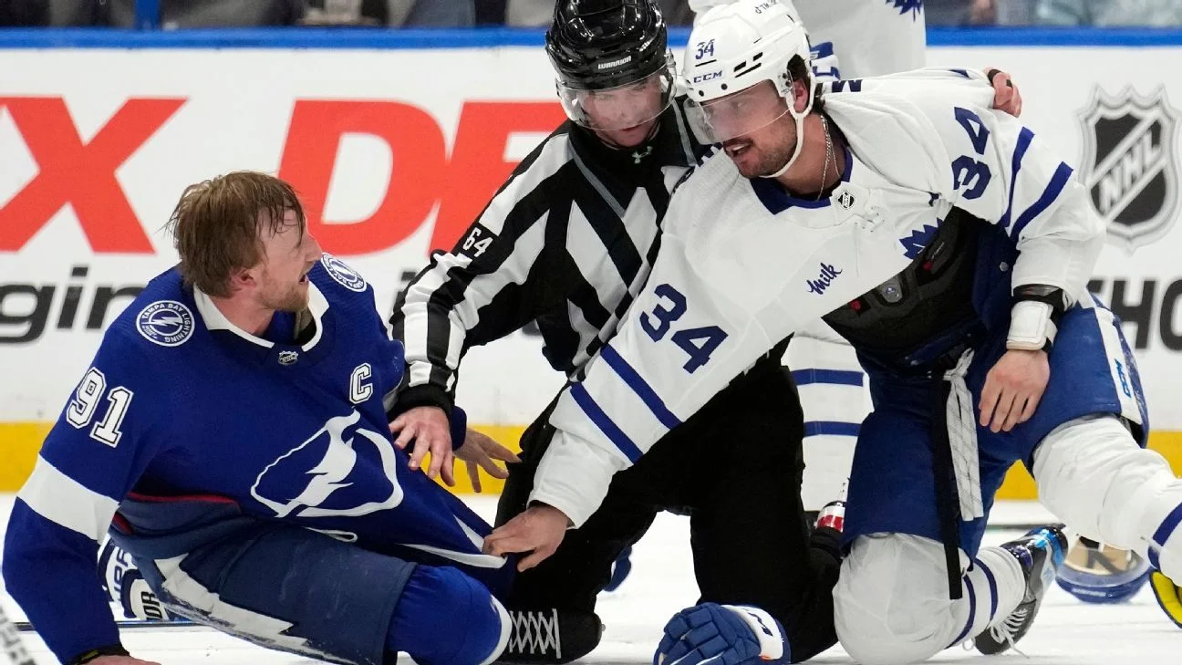 Tempers flare as Maple Leafs and Lightning engage in heated playoff battle.