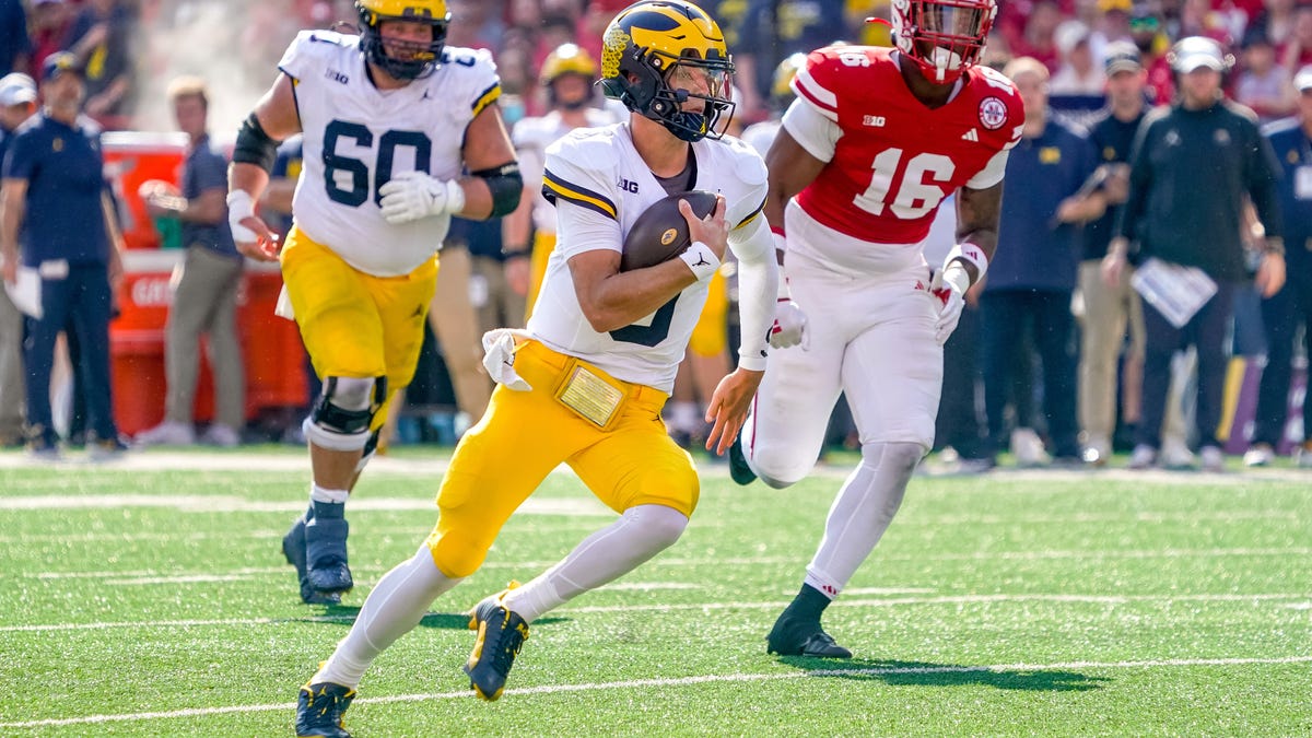 "Michigan Surpasses Georgia in College Football Rankings as Texas Gains Ground"