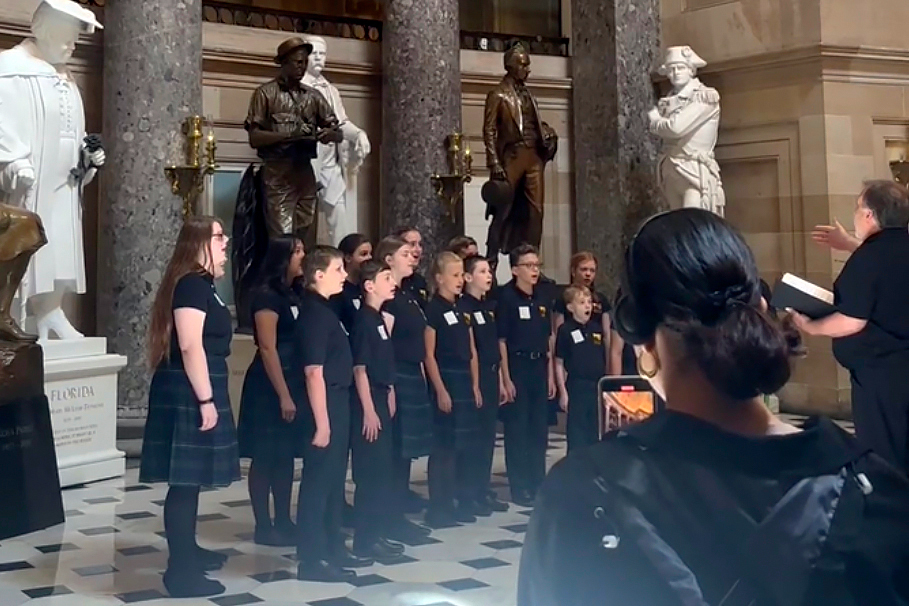 Featured image for Capitol Police under fire for stopping children's choir from singing national anthem.