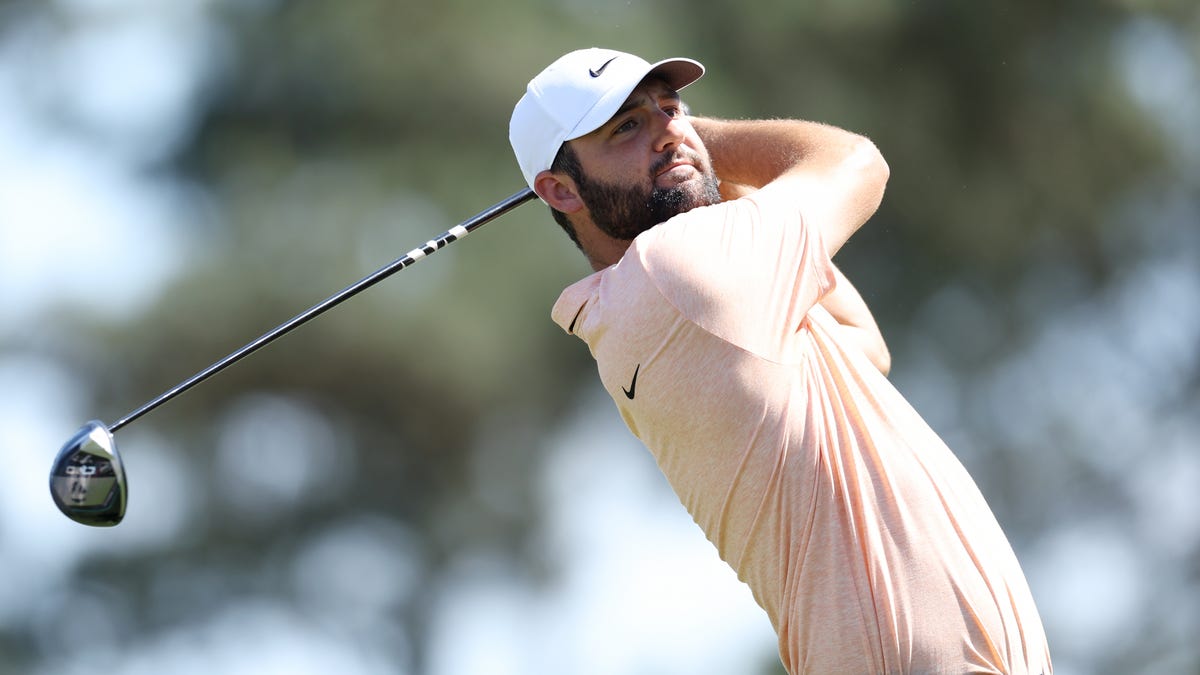 Featured image for "Scottie Scheffler Leads as Tiger Woods Finishes 60th at Masters 2024"