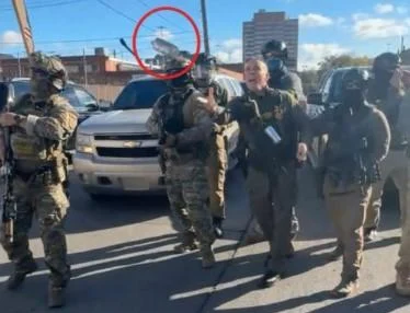 Featured image for Federal Judge Summons Border Patrol Chief Greg Bovino Over Tear Gas Incident in Chicago