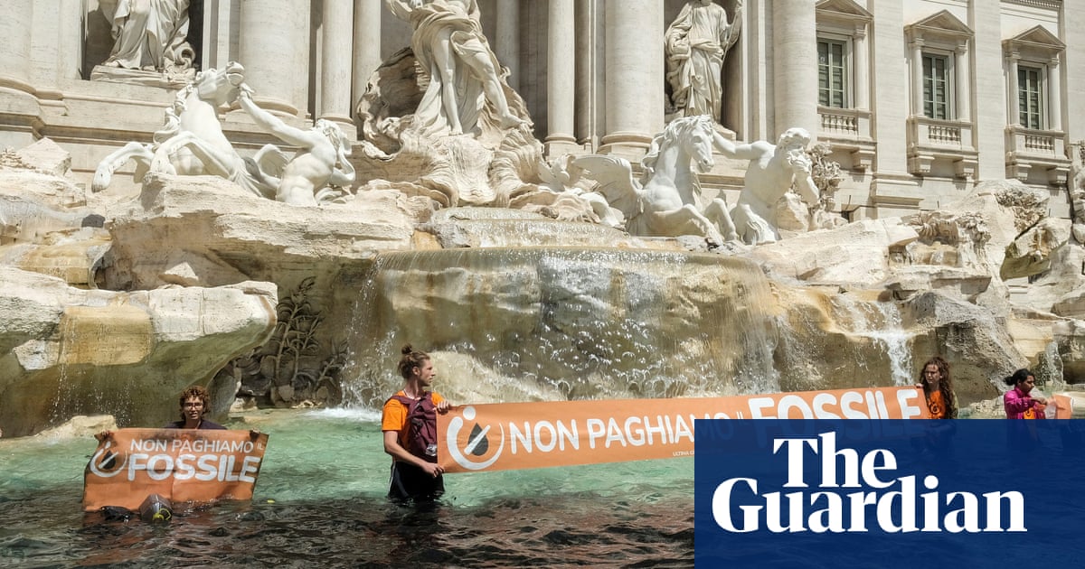 Featured image for Climate activists darken Rome's Trevi Fountain in protest.