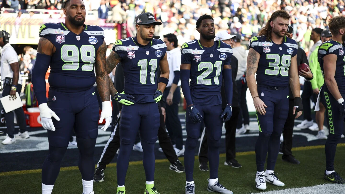 Seahawks lock in 2027 fifth-year options for Smith-Njigba and Witherspoon