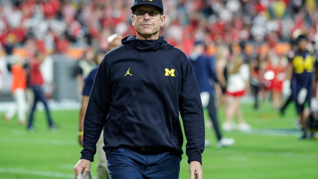 "Vikings Minority Owner Accused of Sabotaging Harbaugh's Legacy with Michigan Football Scandal"
