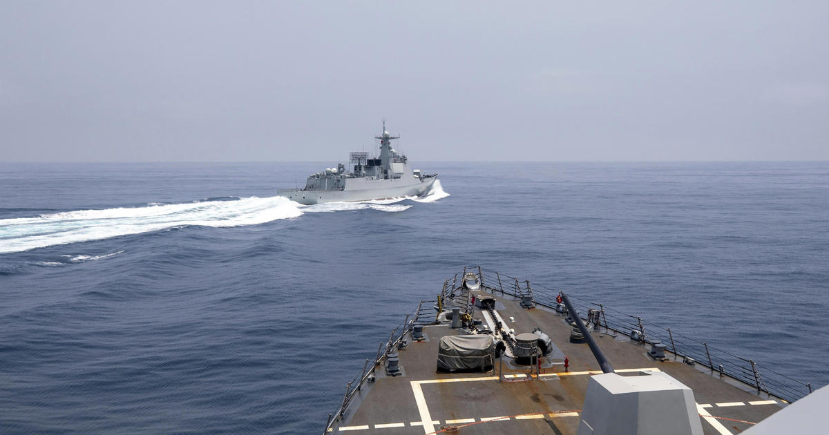 Tensions rise as US and Chinese warships narrowly avoid collision in Taiwan Strait.