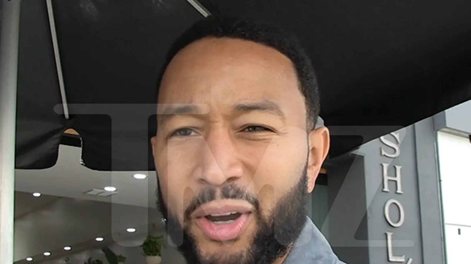 John Legend defends Chrissy Teigen's WHCD dress against Megyn Kelly's criticism.