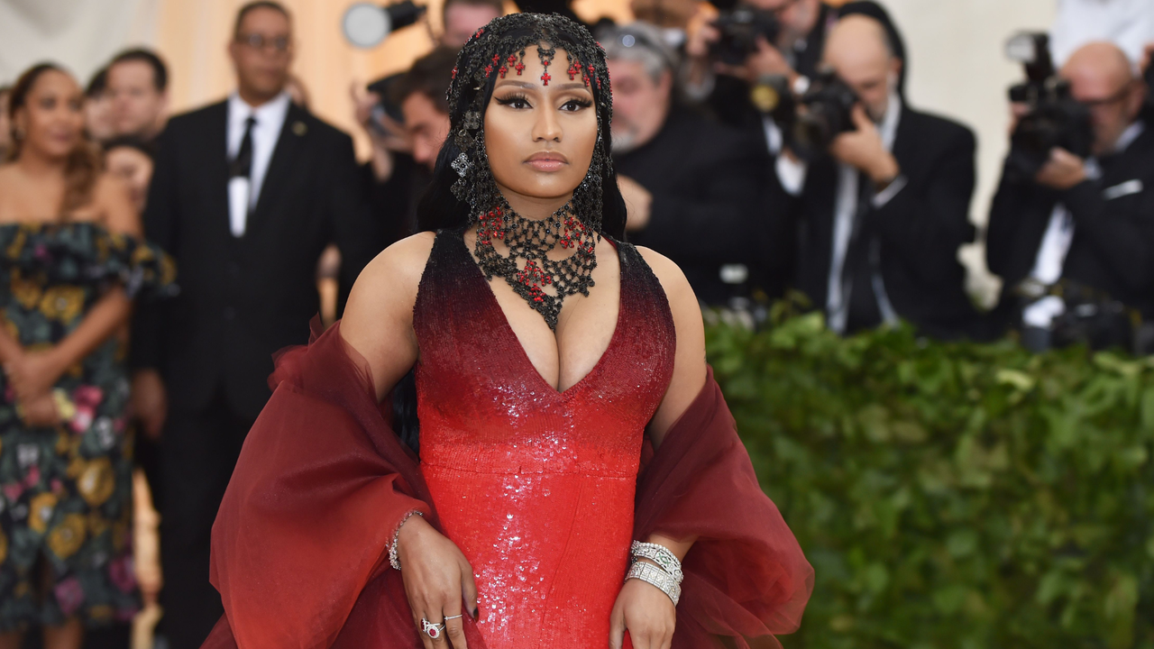 Featured image for Nicki Minaj's Fashion Journey: From 'Pink Friday' to Vogue Cover and Beyond