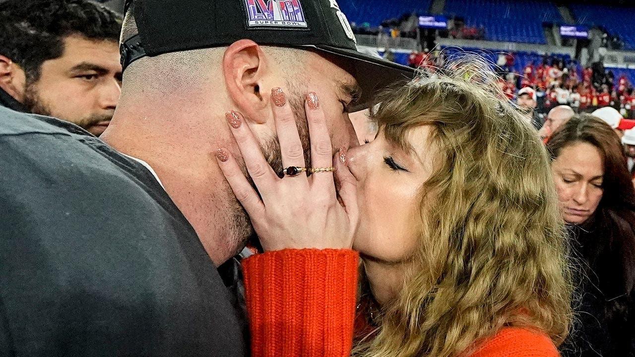 "Taylor Swift's Super Bowl Appearance Sparks Speculation After Celebratory Kiss with Travis Kelce"