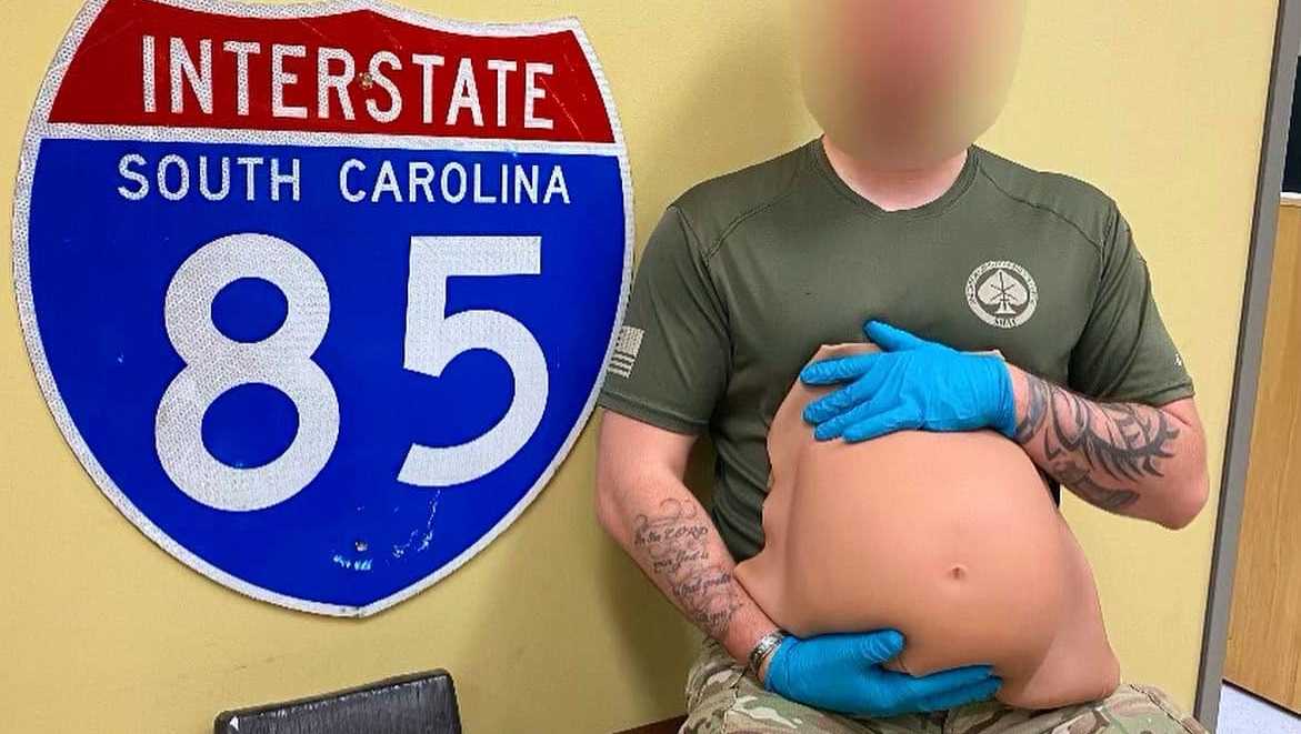 Drug bust: Fake pregnant belly used to hide cocaine during traffic stop.