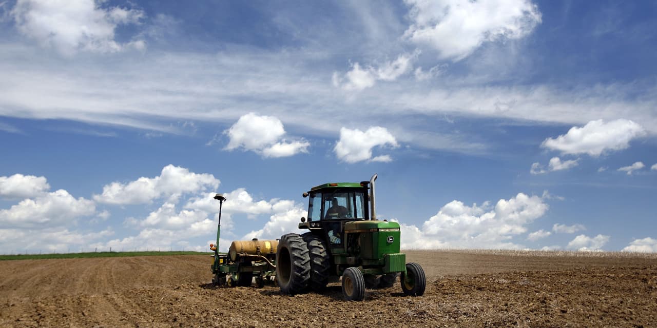 Featured image for Deere beats earnings estimates and raises guidance, stock climbs.