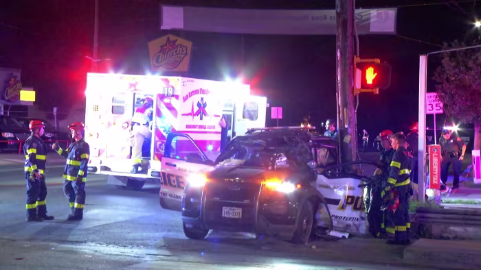 "SAPD Officers Injured in North Side Crash, Rushed to Hospital"