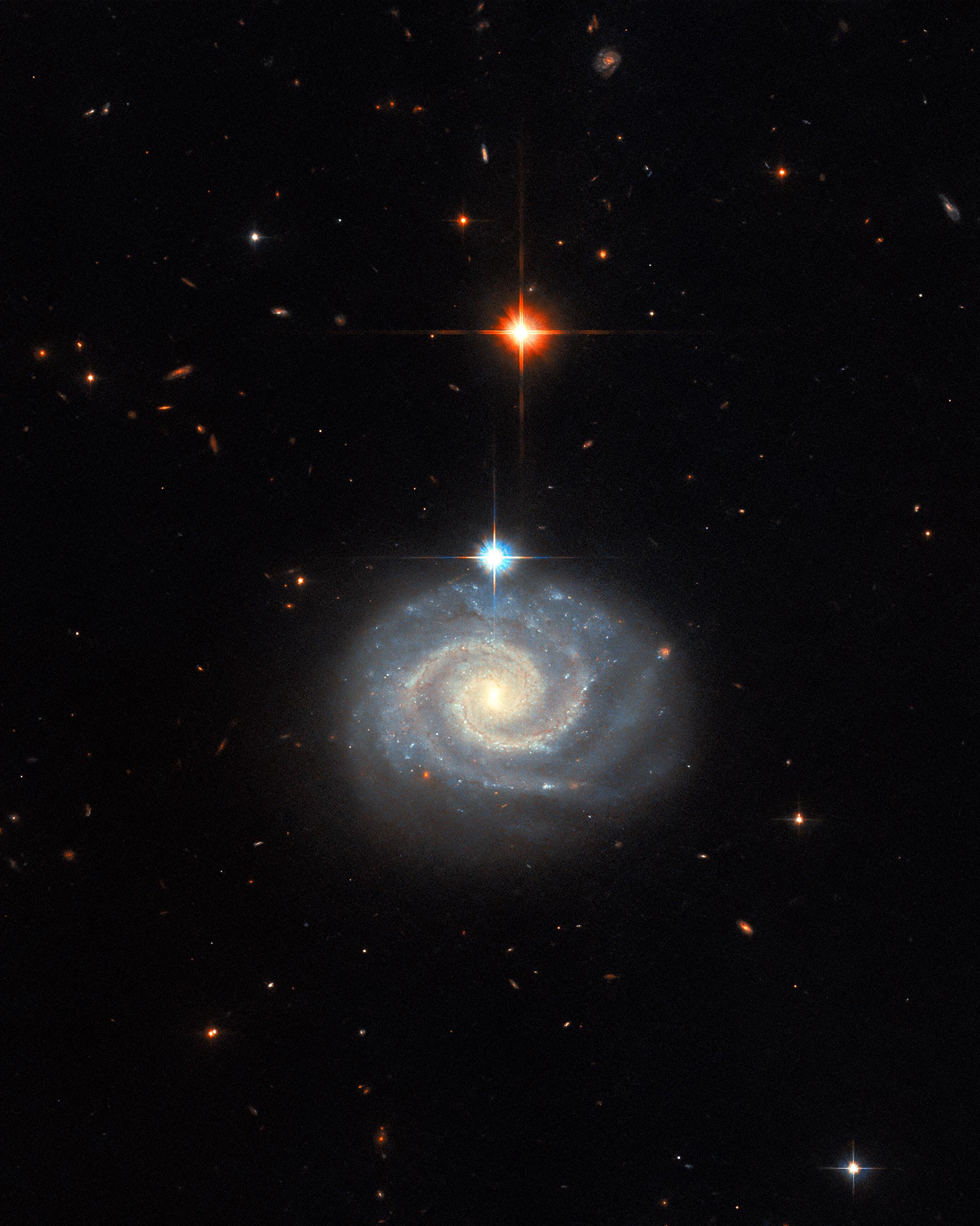 Featured image for "Unveiling the Forbidden Emissions: A Spiral Galaxy Defies Physics"