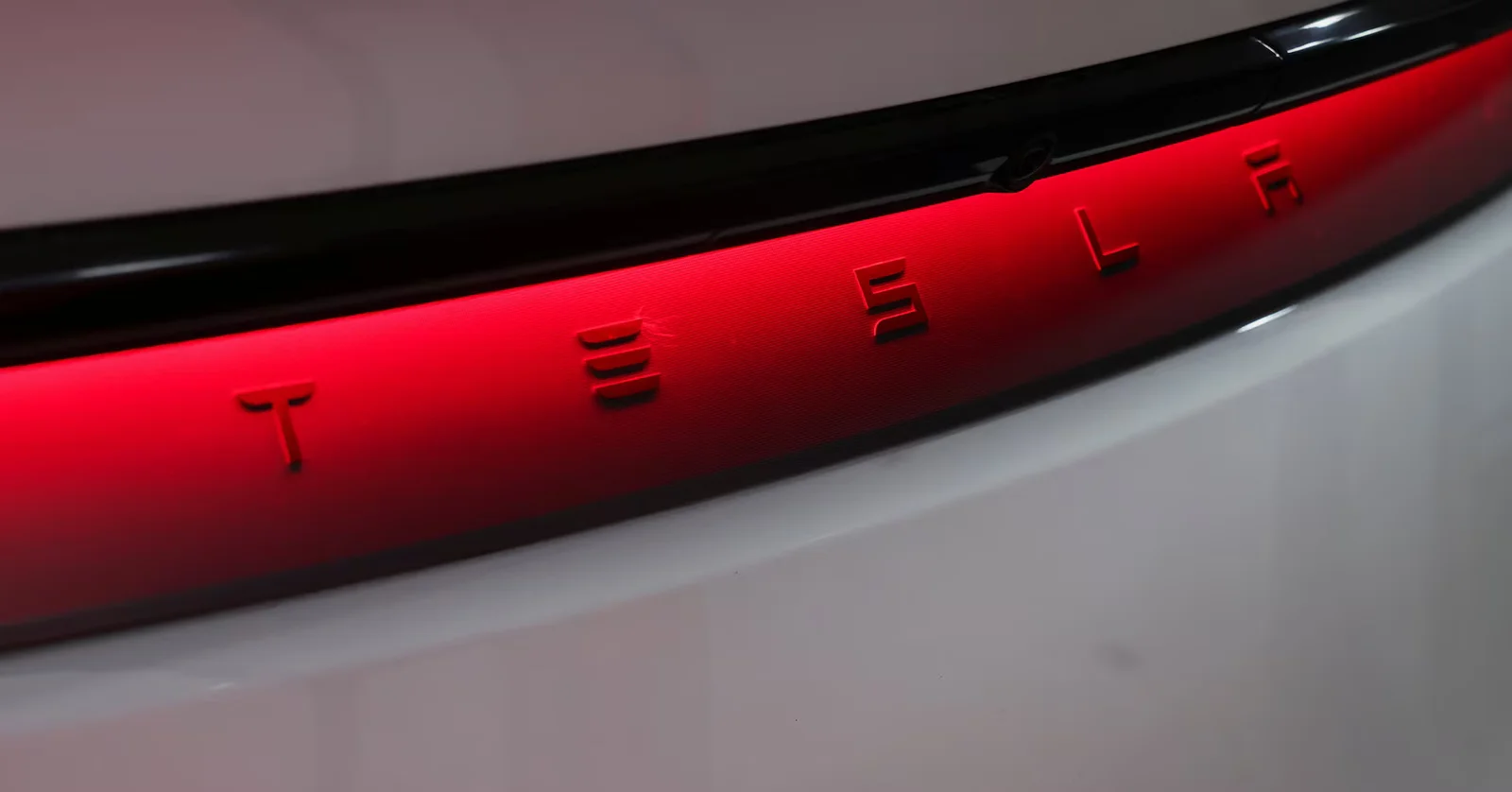 Tesla Restructures AI Initiatives Amid Dojo Challenges