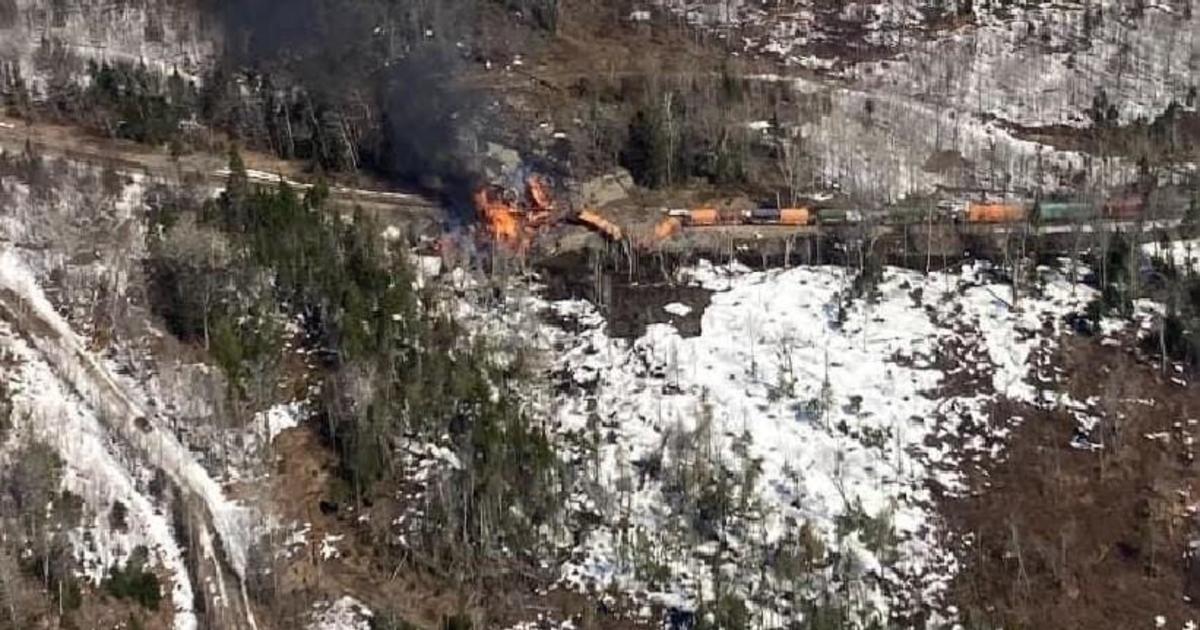 Hazardous materials train derails and catches fire in rural Maine.