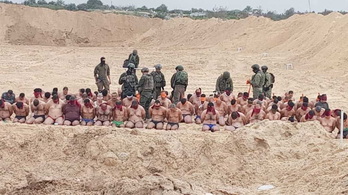 "Disturbing Images Emerge of Palestinian Men Stripped and Detained by Israeli Army in Gaza"