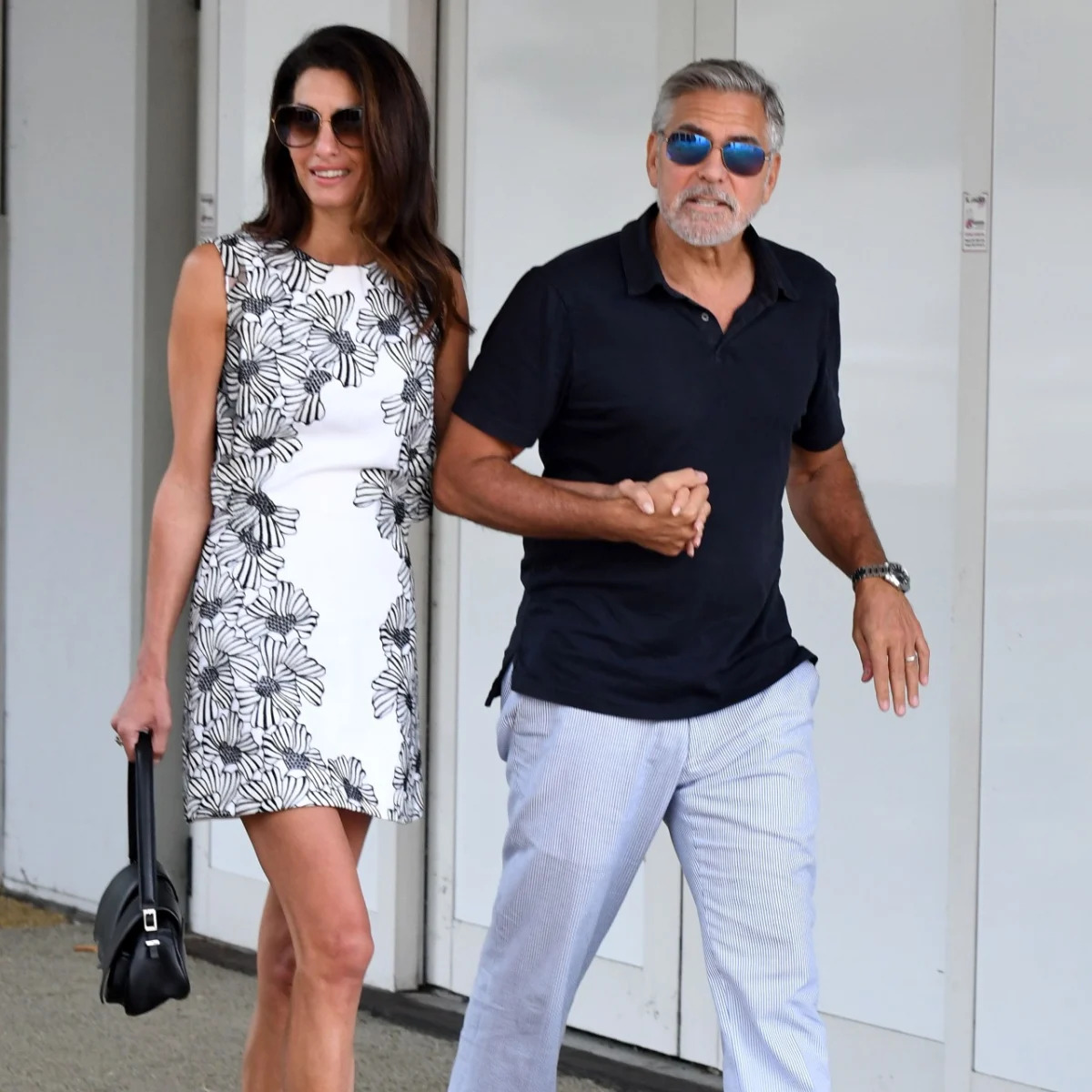 Featured image for George Clooney Acknowledges Marrying Up with Wife Amal, Echoed by All