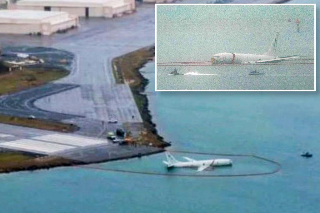 Featured image for Miraculous Escape: Navy Plane Overshoots Runway, Lands Safely in Ocean with All 9 Aboard Unharmed