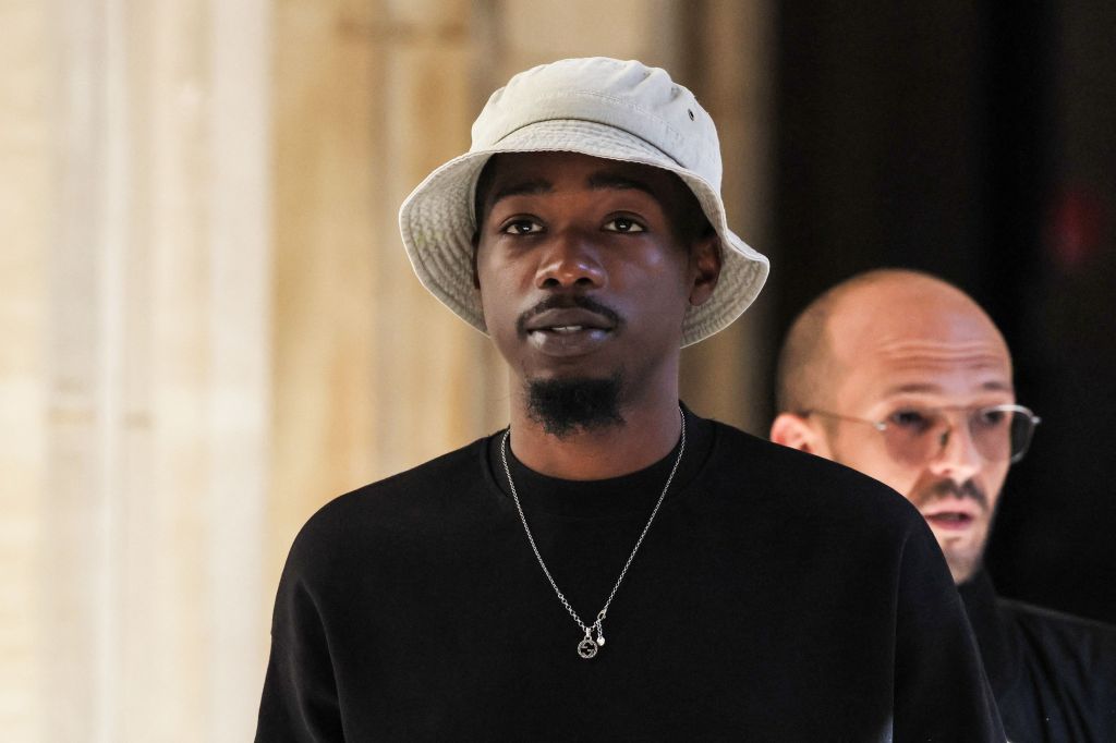 "French Rap Star Receives 18-Year Prison Term for Murder"