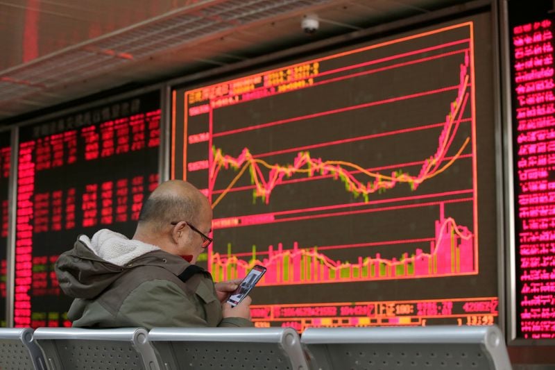 Featured image for Market jitters: Asian stocks dip on Fed and China concerns.