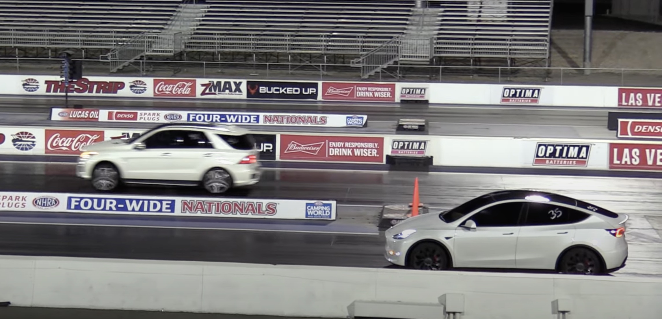 Tesla Model Y Wins Race in Reverse Against AMG SUV and Other Epic Drag Races