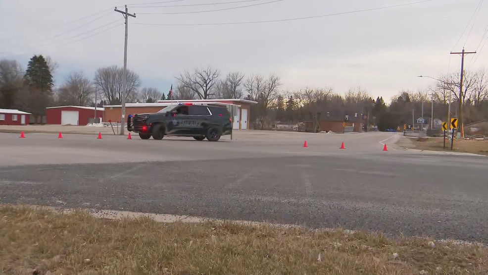 Featured image for "Mother Charged as Search for Missing 3-Year-Old Elijah Vue Continues in Two Rivers"