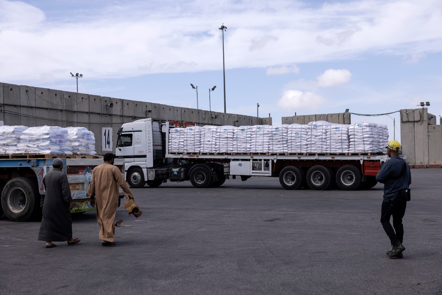 Featured image for "Deadly Attack on Gaza Aid Queue Sparks Outrage Amid Cease-Fire Debate"