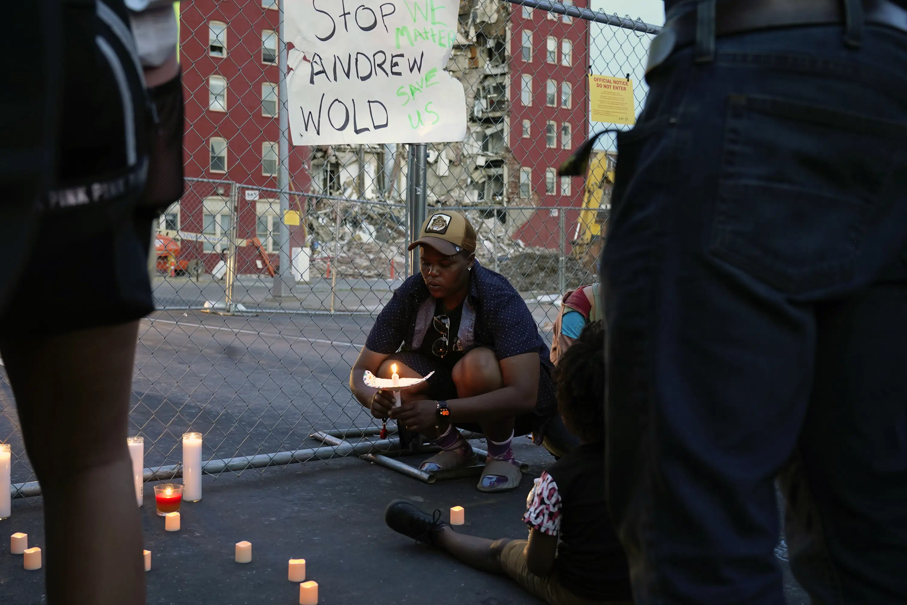Davenport building collapse leaves three missing and mayor with regrets.