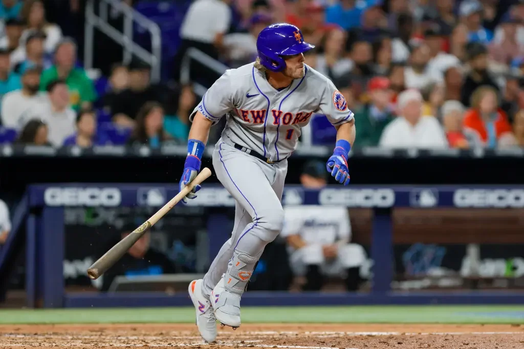 "Mets navigate new rules and win opener against Marlins"