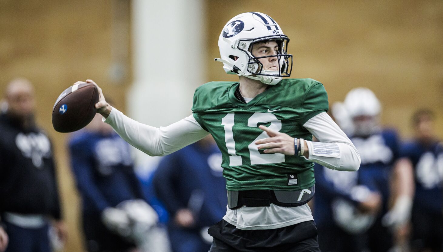 Featured image for Winter weather disrupts BYU football's spring camp, but QBs and defense remain on track.