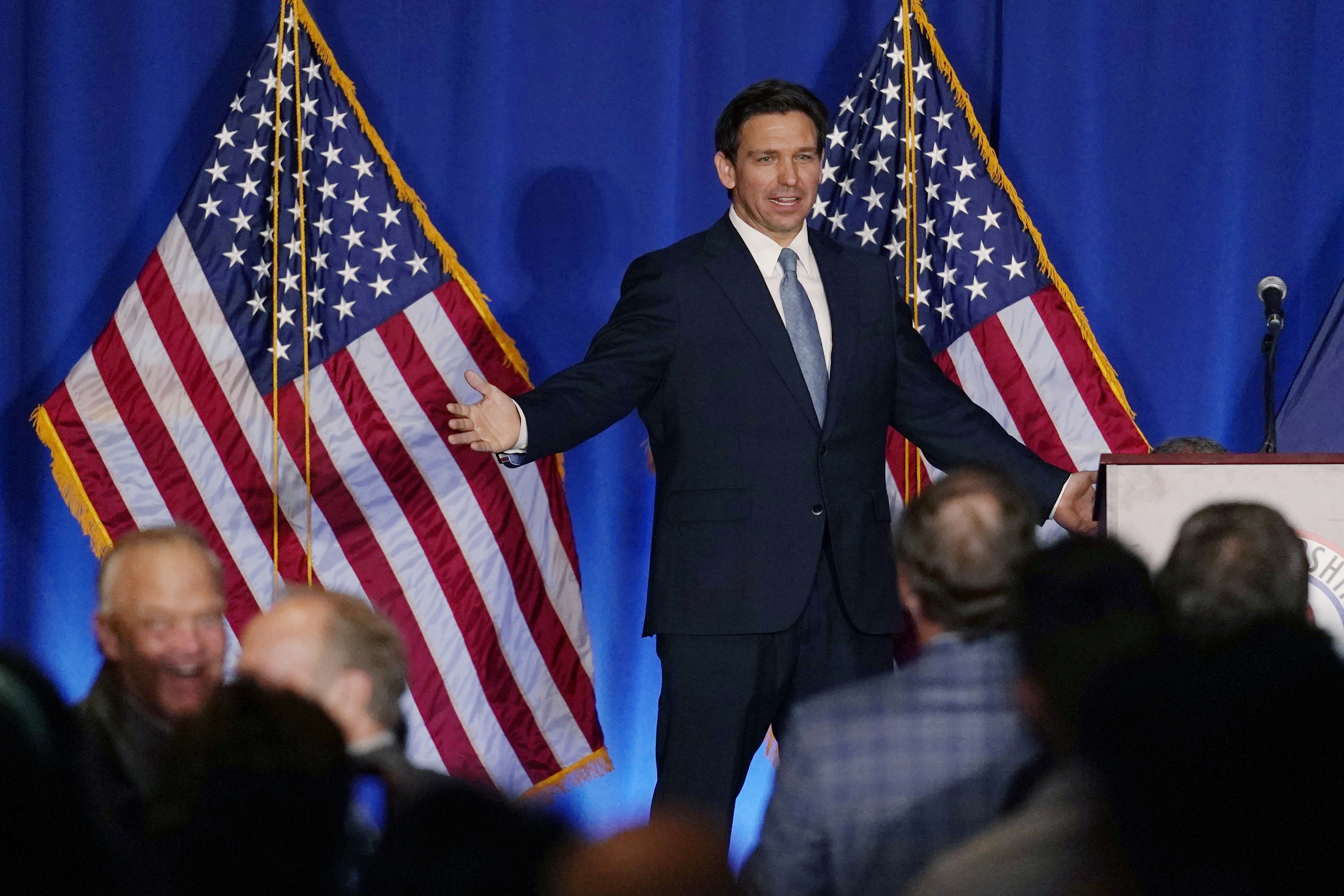 DeSantis faces protesters during New Hampshire GOP speech.