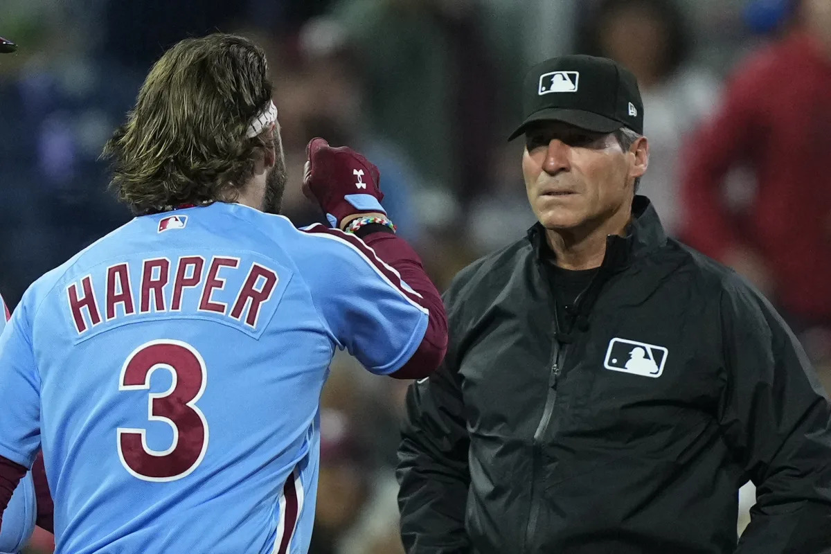 "Bryce Harper's Explosive Ejection: Helmet Tossed, Umpire Confrontation"