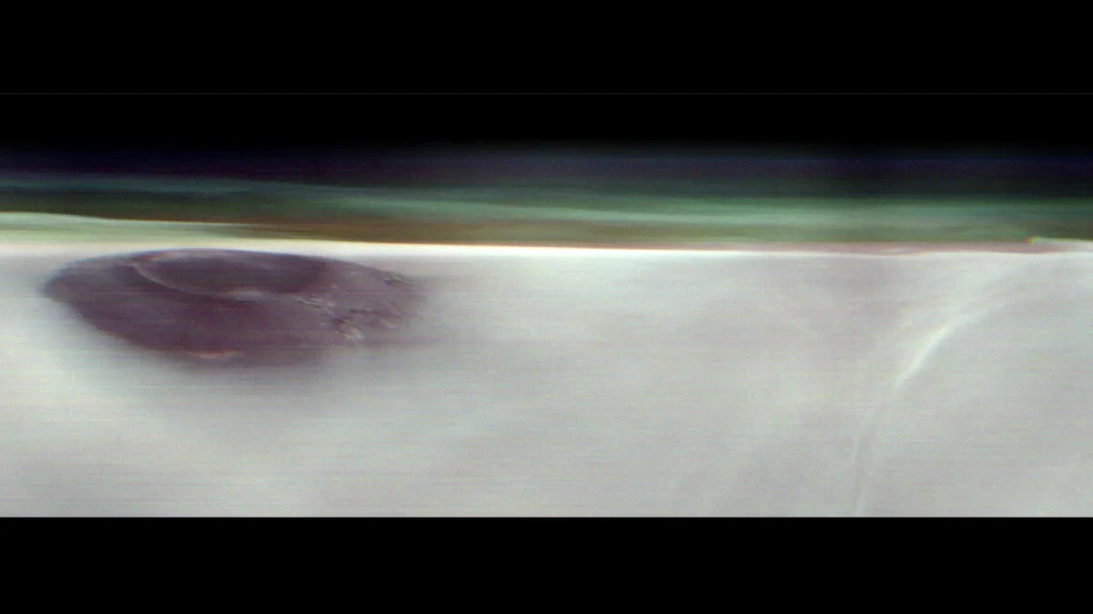 Featured image for NASA Captures Rare Image of Massive Volcano Peeking Through Mars Clouds