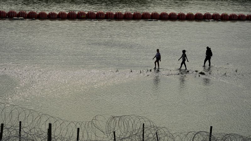 Texas Forced to Remove Migrant Deterrent Barriers on Rio Grande