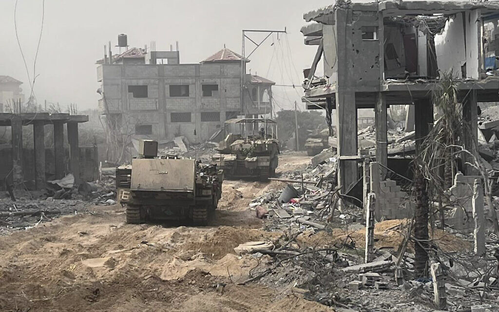 Israeli Troops Escalate Ground Offensive in Gaza City as IDF Toll Rises