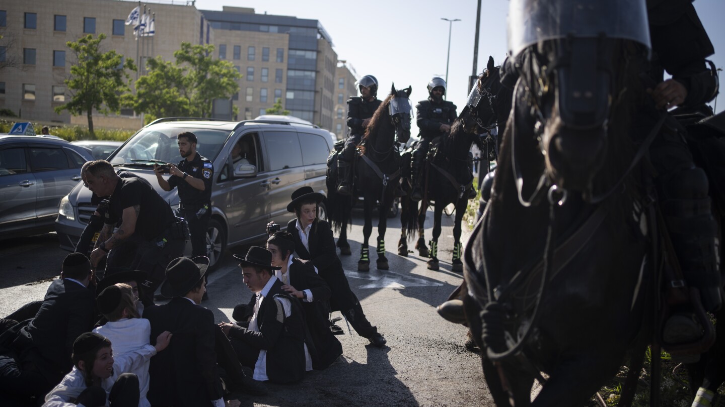 Featured image for "Ultra-Orthodox Protesters Block Jerusalem Roads Over Draft Exemption Ruling"