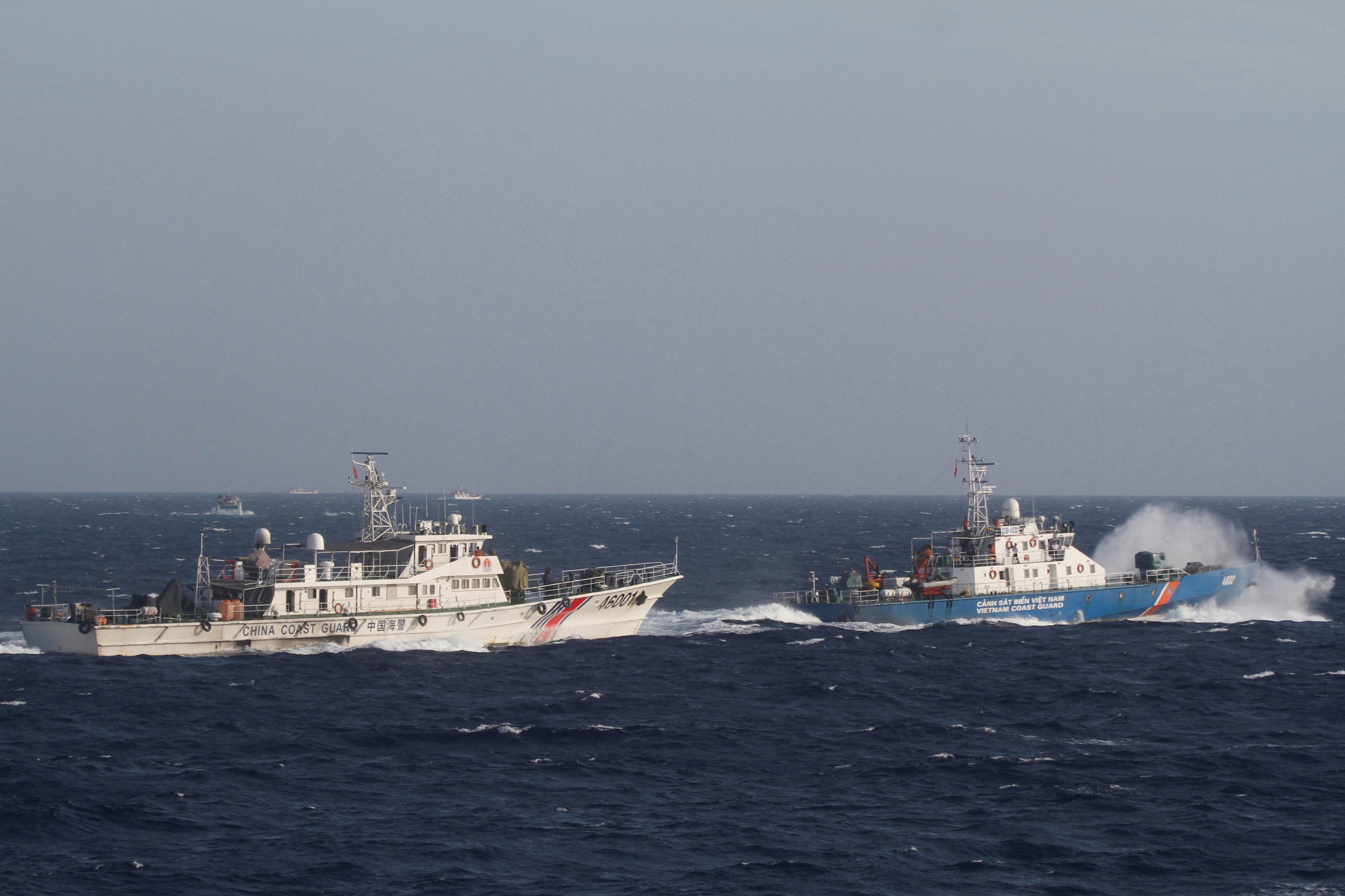 Tensions rise as Chinese ships enter Vietnam's exclusive economic zone near Russian gas block.
