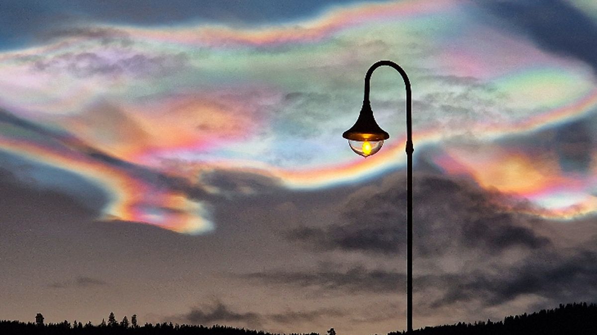 Featured image for Rare and Mesmerizing Rainbow Clouds Illuminate Arctic and Northern Skies