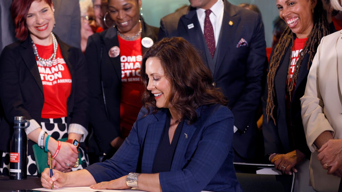 Whitmer signs multiple gun control bills into law.