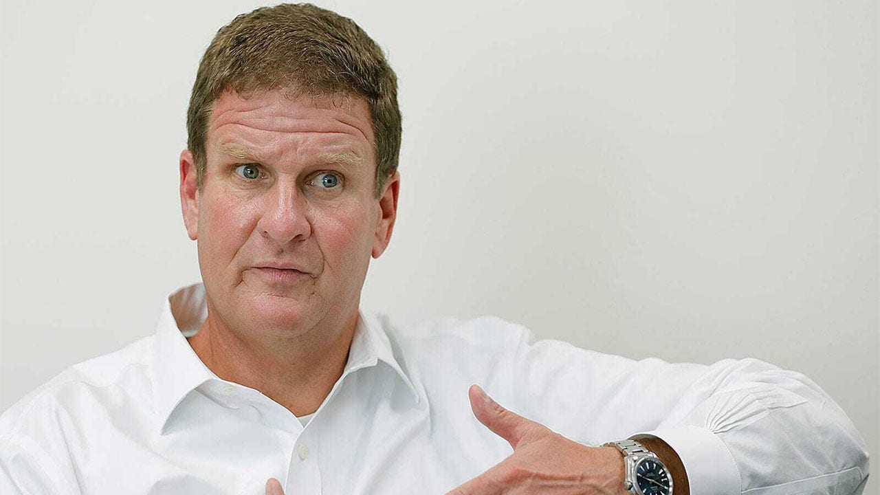 UMass Boston graduates receive surprise $1,000 gift from billionaire Celtics co-owner and keynote speaker.