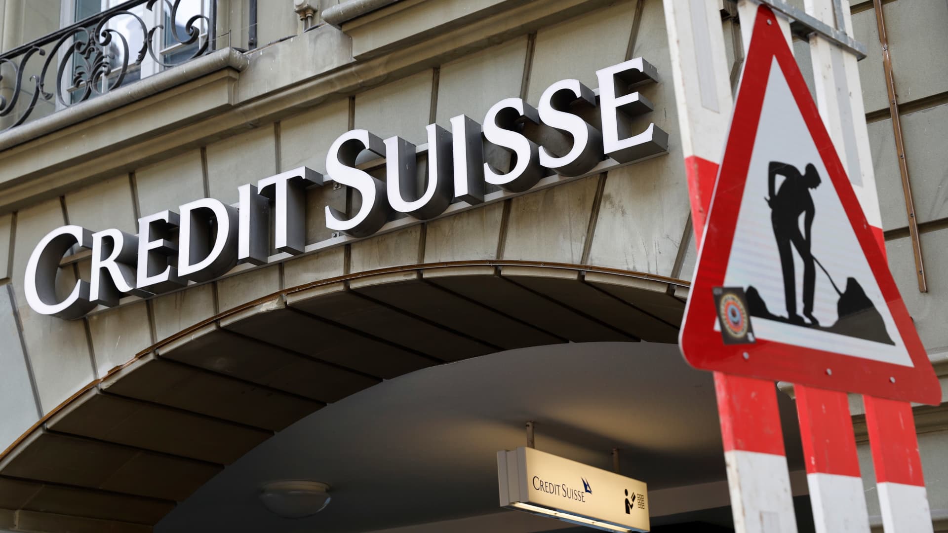 Credit Suisse faces shareholder anger and criminal probe over UBS merger.
