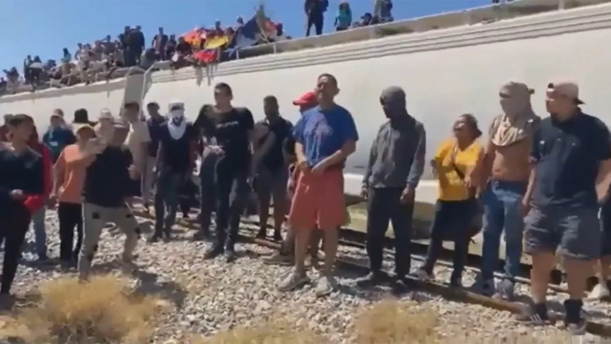 "Migrant-filled Mexican train halted as passengers demand onward journey"