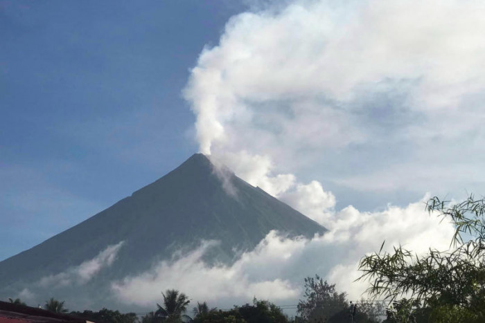 Featured image for Philippine volcano forces mass evacuation due to ash and rock emissions.