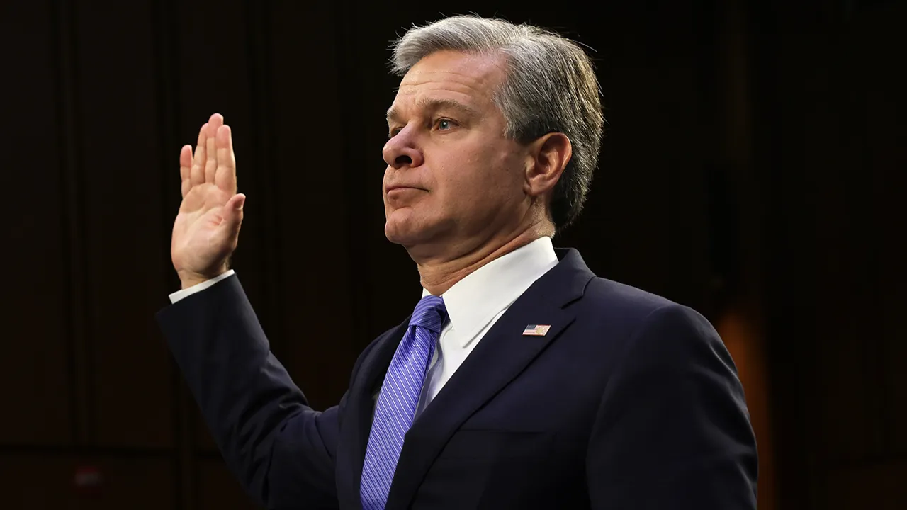 FBI Director Wray faces backlash over handling of Biden document.