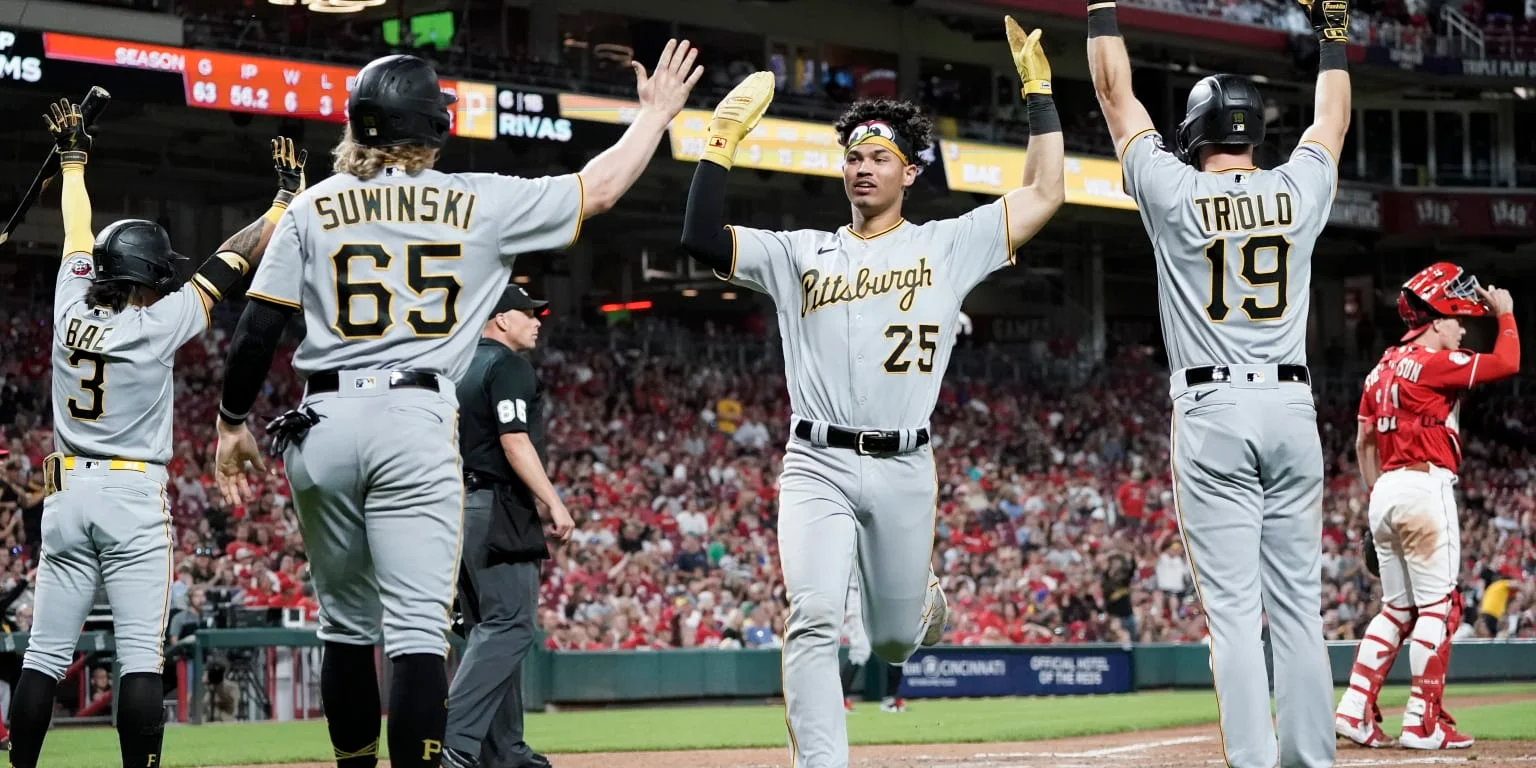 "Pirates Stage Epic Comeback to Overcome Reds in Historic Victory"