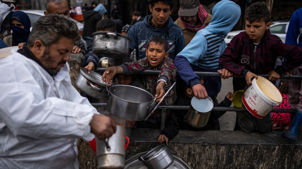 "Deadly Strike: Massacre of Palestinians Waiting for Aid in Gaza"