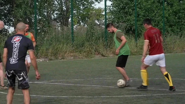 Ukrainian soldiers and teachers find solace in soccer and education amidst war
