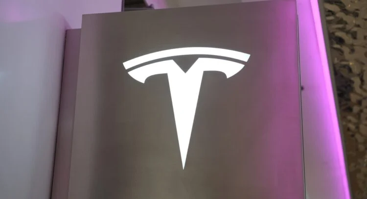 Featured image for Tesla Faces Profit Decline Amid Price Cuts and Market Challenges